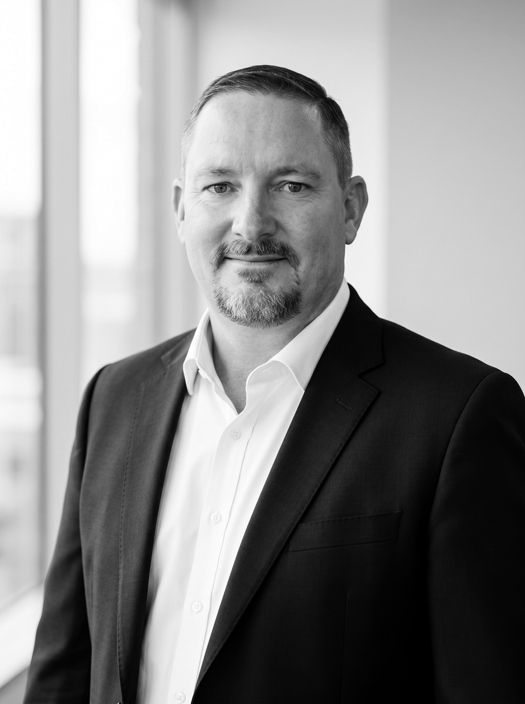 Shane Evans, Director, Operations & Compliance at Custom Management Group
